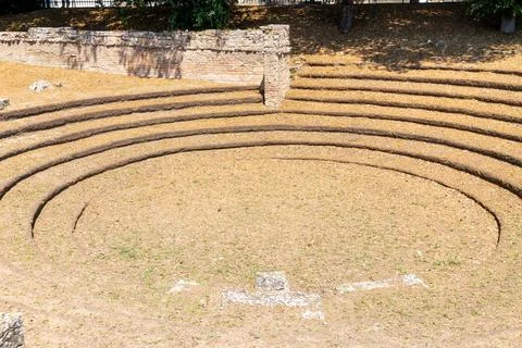 Concentric seating rows in ancient amphitheater remains Stock Photos