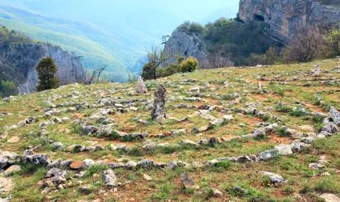 Concentric stone circles on spring plateau Stock Photos
