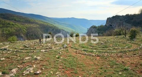 Concentric stone circles on spring plateau Stock Photos