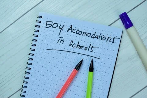 Concept of 504 Accomodations in Schools write on book isolated on Wooden Table Stock Photos