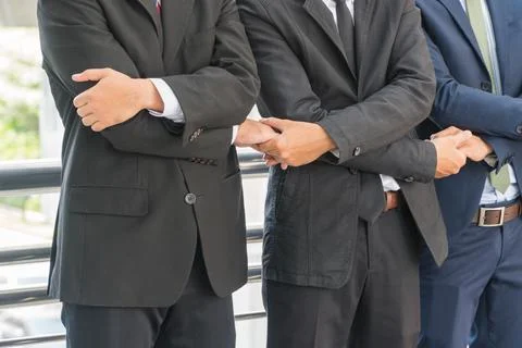 Concept about teamwork, Focus arm handshake. Stock Photos