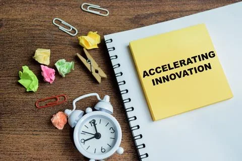 Concept of accelerating innovation write on sticky notes Stock Photos