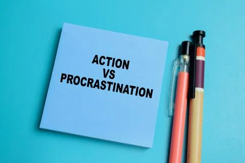 Concept of action vs procrastination write on sticky notes isolated on table. Stock Photos