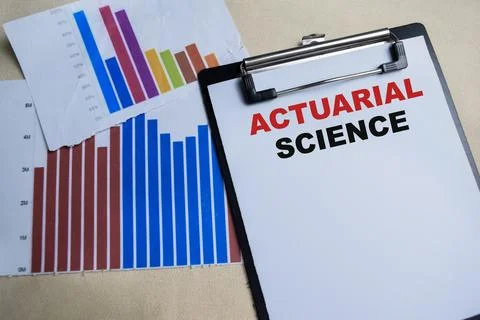 Concept of Actuarial science write on clipboard isolated on Wooden Table. Stockfoto's