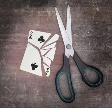 Concept of addiction, card with scissors Fotos de archivo