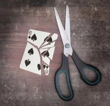 Concept of addiction, card with scissors Stockfoto's