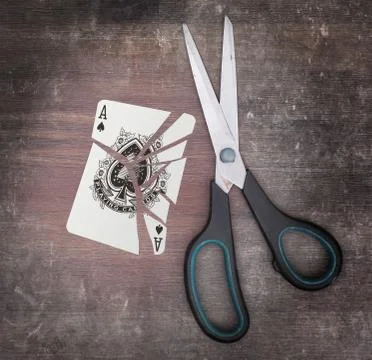 Concept of addiction, card with scissors 스톡 사진