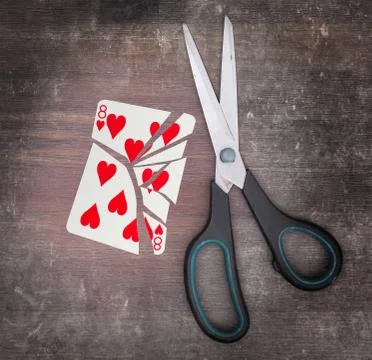 Concept of addiction, card with scissors Fotos de archivo
