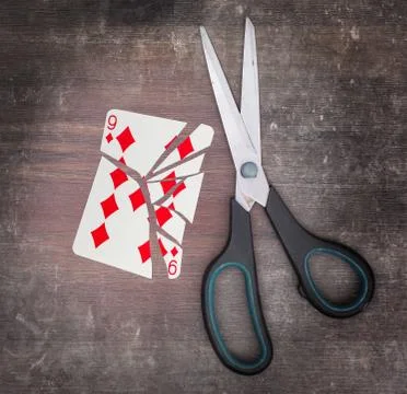 Concept of addiction, card with scissors 写真素材