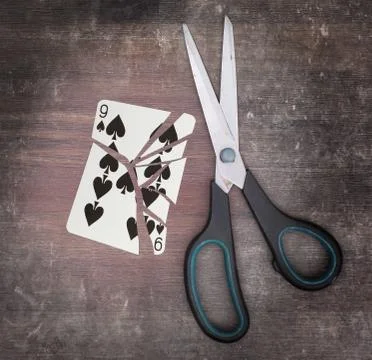 Concept of addiction, card with scissors Fotos de archivo
