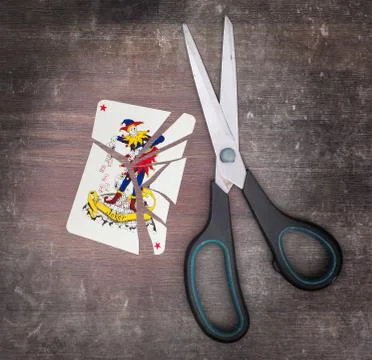 Concept of addiction, card with scissors Stockfoto's