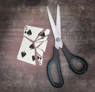 Concept of addiction, card with scissors Fotos de archivo