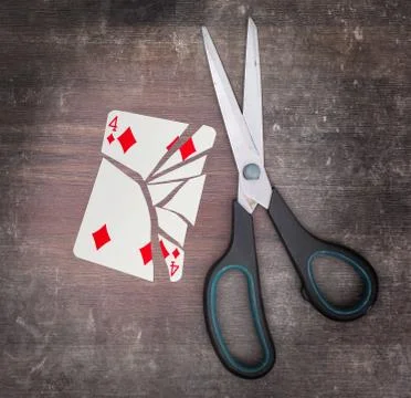 Concept of addiction, card with scissors 写真素材