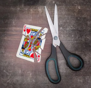 Concept of addiction, card with scissors 스톡 사진
