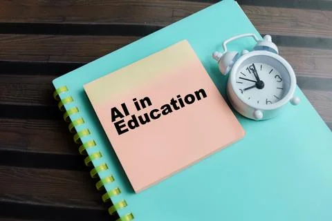 Concept of AI in education write on sticky notes isolated on Wooden Table. Stockfoto's