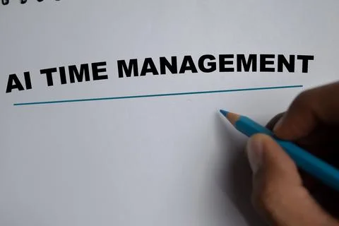 Concept of ai time management write on book isolated on Wooden Table. Stockfoto's