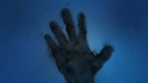 Concept animation of a hand shadow, evil background, built from particles Stock Footage 314557331