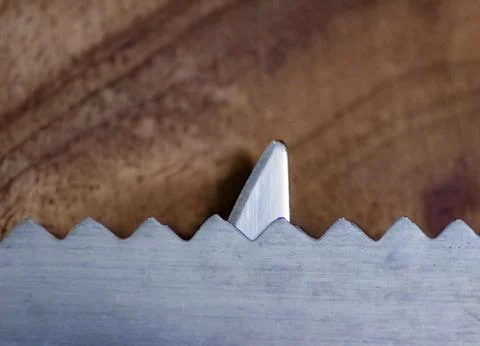 Concept art using knife showing shark beyond the waves Stock Photos