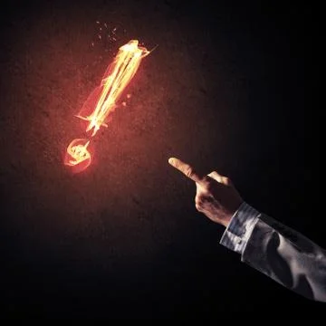 Concept of attention or punctuation with burning exclamation mar Foto stock