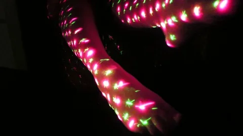 Concept augmented reality - legs isolated multiculored lights Stock Footage 71412636