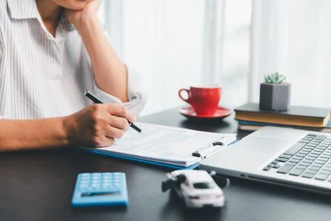 Concept of automobile ownership involves managing expenses such as insuranc.. Stock Photos