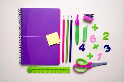 Concept back to school. Alarm clock and School supplies. Top View Flat Lay Stock Photos
