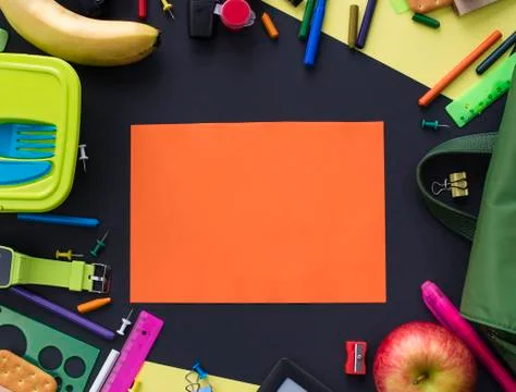 Concept back to school apple backpack stationery on black background. Stock Photos