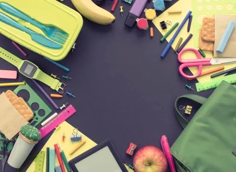 Concept back to school apple backpack stationery on black background. Stock Photos