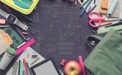 Concept back to school apple backpack stationery on black background. Stock Photos