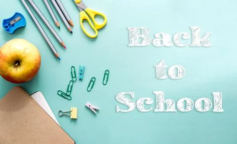 Concept back to school creative top view. White chalk letters on paper. Schoo Stock Photos