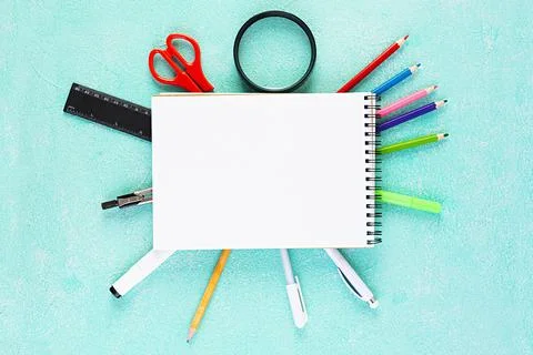 Concept back to school. Different supplies for sketch. School accessories. Stock Photos