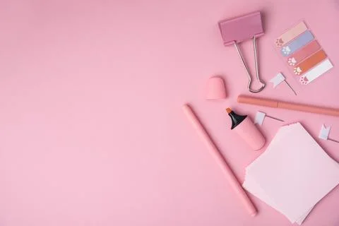 The concept of Back to school. School or office stationery on a pink backgrou Stock Photos