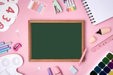 The concept of Back to School. School or office stationery yellow on a pink b Stock Photos