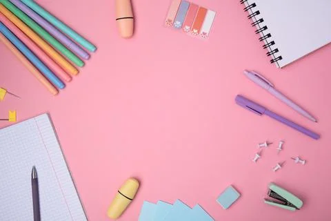 The concept of Back to School. School or office stationery yellow on a pink b Stock Photos