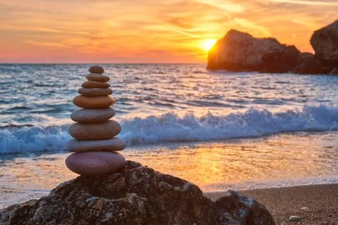 Concept of balance and harmony - stone stack on the beach Stock Photos