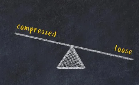 Concept of balance between compressed and loose. Black chalboard with sketch  Foto stock