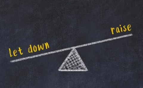 Concept of balance between let down and raise. Black chalboard with sketch of Foto stock