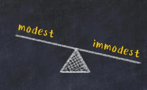 Concept of balance between modest and immodest. Black chalboard with sketch o Foto stock