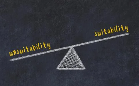 Concept of balance between unsuitability and suitability. Black chalboard wit 写真素材