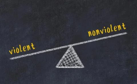 Concept of balance between violent and nonviolent. Black chalboard with sketc Foto stock