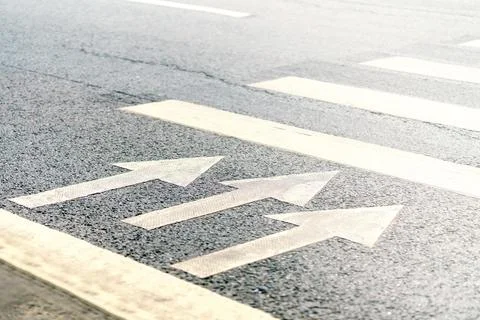 The concept of the beginning and start. Three arrows show in the direction of Stock Photos