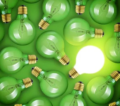 Concept for big idea. Glowing light bulb on green background Photos