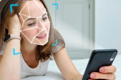Concept biometric technology built into the phone for face identification and Stockfoto's