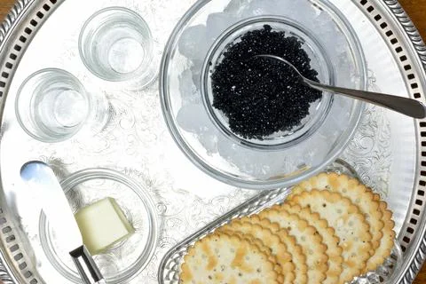 Concept with black caviar Stock Photos