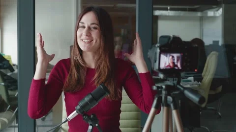 Concept of blogging and video broadcasts. Young female blogger recording video o Stock Footage 150779319