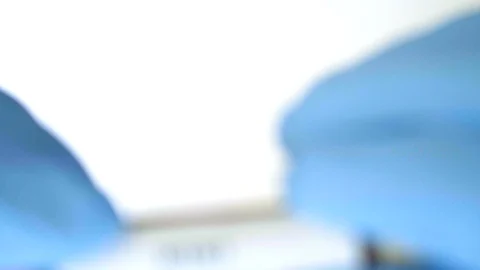 Concept blood test. Hands in blue gloves, hold the tube with real blood. Stockbeeldmateriaal 106489584