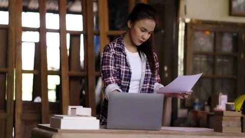 Concept blue collar worker. carpenter is designing furniture models in wood Stock Footage 205799403