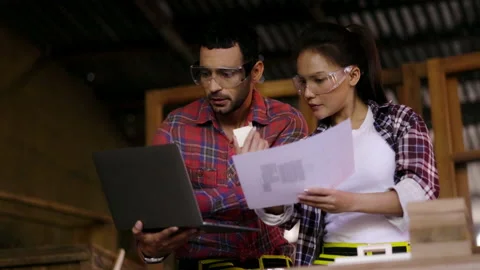 Concept blue collar worker. carpenter is designing furniture models in wood Stock Footage 205800418