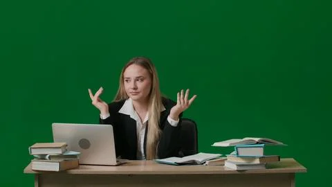 Concept of brainstorming and problem solving. Female portrait on green screen Stock Photos