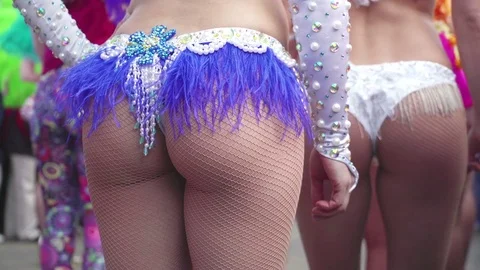 Concept Brazilian carnival. Street Samba dancers in full costume before start of Stock Footage